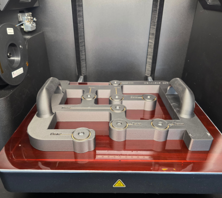 Large 3D printed drill jig on build plate of FX10